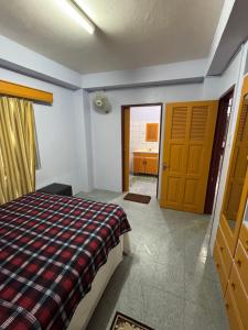 Postel nebo postele na pokoji v ubytování Ashnis Apartment - Sigatoka Town House Apartment