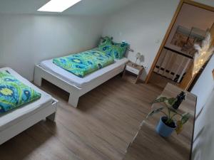 Кровать или кровати в номере Huus Meta Modern retreat
