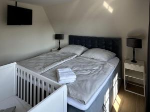 Postel nebo postele na pokoji v ubytování Maila - MarBi Alles inbegrepen