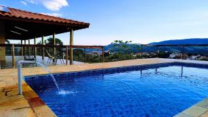Bazén v ubytování Chácara Primavera, visual único! nebo v jeho okolí