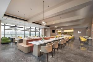 Posezení v ubytování Hampton by Hilton Guangzhou Huangpu Sports Center