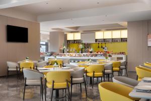 Restaurace v ubytování Hampton by Hilton Guangzhou Huangpu Sports Center