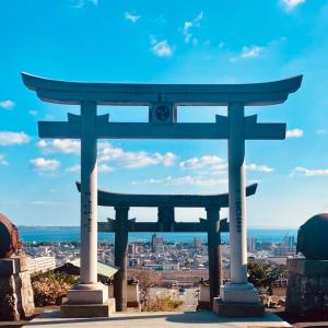 a blue pagoda with a view of a city at Shiki Villa Beppu in Beppu +86 photos
