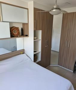 Postel nebo postele na pokoji v ubytování Apart Barra Olimpica Prox Riocentro e FarmasiArena