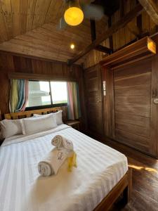 En eller flere senge i et værelse på Matterhorn B&B