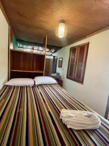 Voodi või voodid majutusasutuse Hotel Mon Ami toas