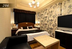 Μια τηλεόραση ή/και κέντρο ψυχαγωγίας στο Hotel Ayung 大人専用