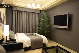 Μια τηλεόραση ή/και κέντρο ψυχαγωγίας στο Hotel Ayung 大人専用