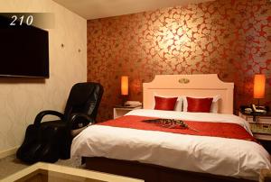 Ένα ή περισσότερα κρεβάτια σε δωμάτιο στο Hotel Ayung 大人専用