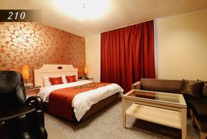 Ένα ή περισσότερα κρεβάτια σε δωμάτιο στο Hotel Ayung 大人専用