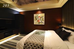 Ένα ή περισσότερα κρεβάτια σε δωμάτιο στο Hotel Ayung 大人専用