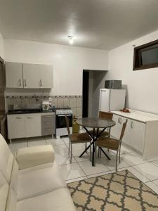 Køkken eller tekøkken på Ótimo apartamento