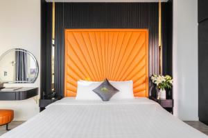 Voodi või voodid majutusasutuse Greenview City Hotel toas