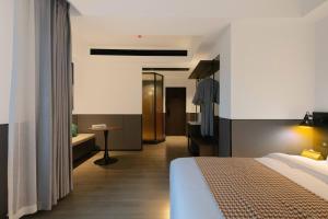 Mcsrh Hotel-Changsha IFS and WUYI Plaza客房内的一张或多张床位