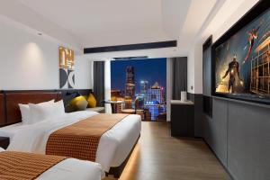 Mcsrh Hotel-Changsha IFS and WUYI Plaza客房内的一张或多张床位
