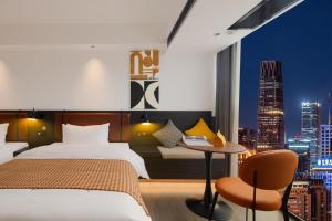 Mcsrh Hotel-Changsha IFS and WUYI Plaza客房内的一张或多张床位