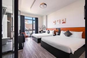 Voodi või voodid majutusasutuse Greenview City Hotel toas