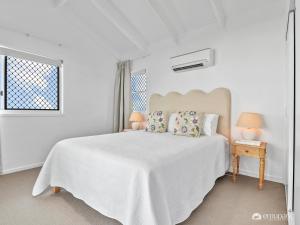 Ένα ή περισσότερα κρεβάτια σε δωμάτιο στο Bungalow On Bright - BOBs