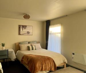 Postel nebo postele na pokoji v ubytování AAA Northlands Motel