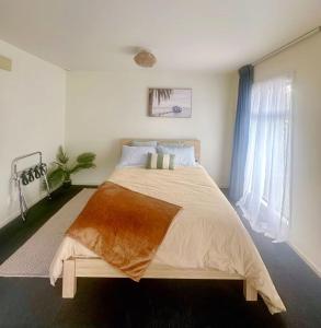 Postel nebo postele na pokoji v ubytování AAA Northlands Motel