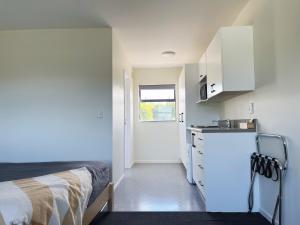 Kuchyň nebo kuchyňský kout v ubytování AAA Northlands Motel