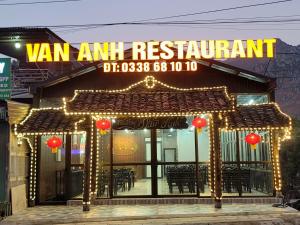 a restaurant with a sign that reads van am restaurant at Van Anh Hotel - Restaurant in Dồng Văn