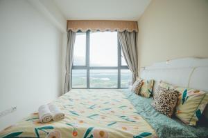 Ένα ή περισσότερα κρεβάτια σε δωμάτιο στο Macrolink Medini Starry Stay 3BR 5pax by Our Stay +74 φωτογραφίες