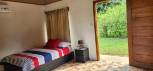 Postel nebo postele na pokoji v ubytování Rios-lodge