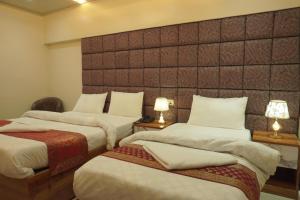 Postel nebo postele na pokoji v ubytování Classy5 Guest House