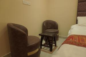 Postel nebo postele na pokoji v ubytování Classy5 Guest House