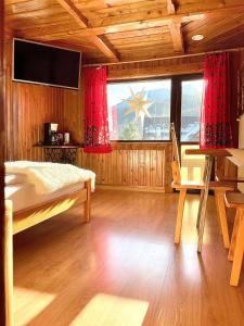 Posteľ alebo postele v izbe v ubytovaní Z Giewontem w Tle Apart&Room
