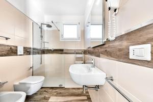Koupelna v ubytování Jesolo Village Beach House - Host Solution