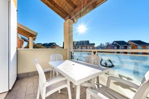 Bazén v ubytování Jesolo Village Beach House - Host Solution nebo v jeho okolí + 37 fotografií