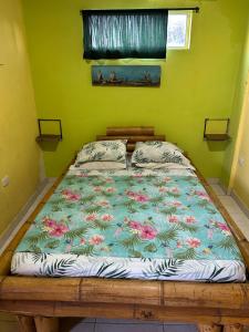 Postel nebo postele na pokoji v ubytování Hostal Bambumar