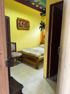 Postel nebo postele na pokoji v ubytování Hostal Bambumar
