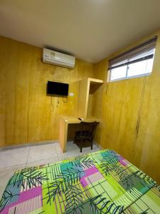TV a/nebo společenská místnost v ubytování Hostal Bambumar