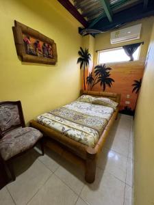 Postel nebo postele na pokoji v ubytování Hostal Bambumar