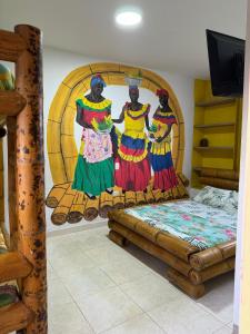 Postel nebo postele na pokoji v ubytování Hostal Bambumar