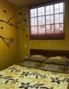 Postel nebo postele na pokoji v ubytování Hostal Bambumar
