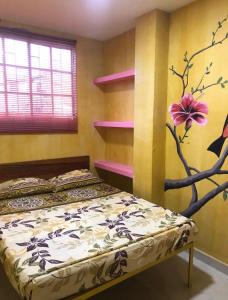 Postel nebo postele na pokoji v ubytování Hostal Bambumar
