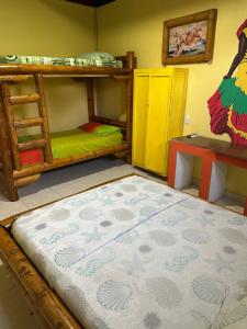 Postel nebo postele na pokoji v ubytování Hostal Bambumar