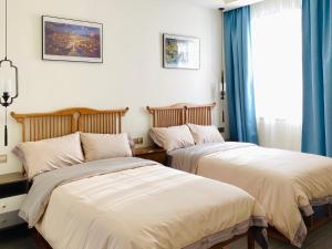 Fuxian Lake Qishe B&B客房内的一张或多张床位