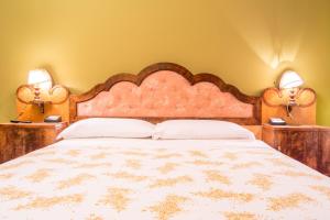 Кровать или кровати в номере Cluana Azienda Agrituristica