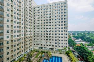 an aerial view of two tall buildings at Minimalist and Comfy 2BR at Titanium Square Apartment By Travelio in Jakarta