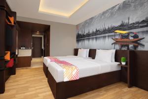 Letto o letti in una camera di Ginger Srinagar Barzulla Near Srinagar Airport