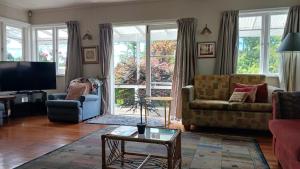 Predel za sedenje v nastanitvi Magpie Cottage Homestay Bed & Breakfast