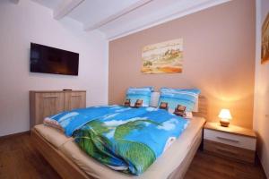 Postel nebo postele na pokoji v ubytování Ferienhaus-Moewenschiss