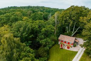 an aerial view of a house in the woods at Holma Stångenäs Golf in Brastad