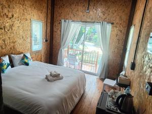 Postel nebo postele na pokoji v ubytování Nathan Breeze Resort