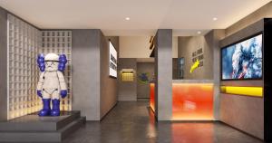 TV a/nebo společenská místnost v ubytování Mcsrh Hotel-Shenzhen Liutang